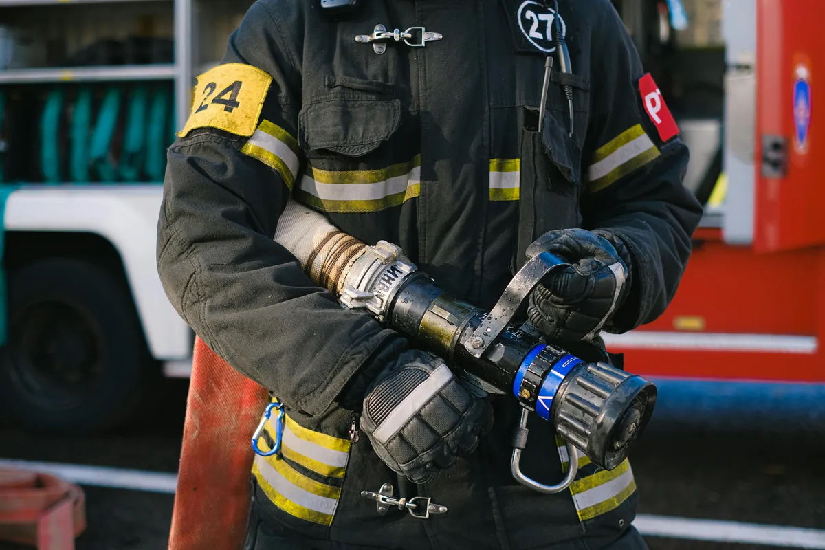 Professional firefighter with equipment